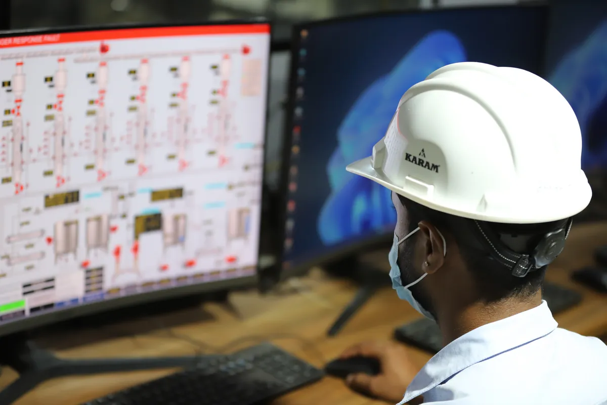 Engineer monitoring SCADA control system